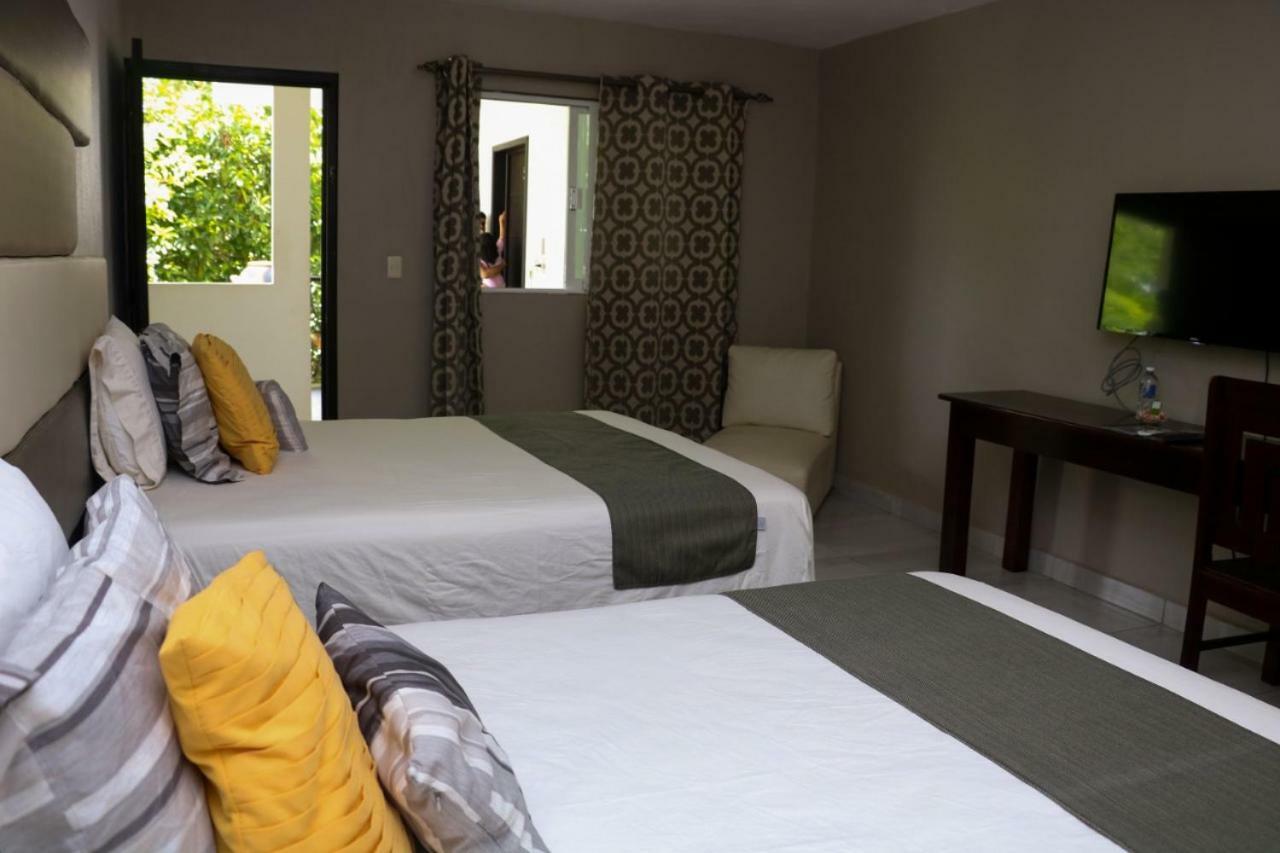 Garden Suites Tonala Bagian luar foto